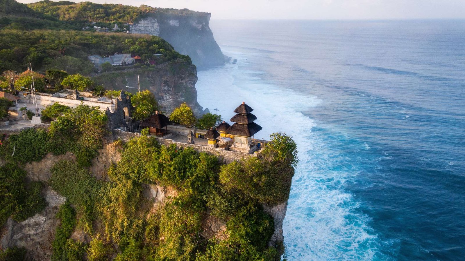 Sunset at Uluwatu Temple, a highlight of the Best Bali Tour Packages with cultural heritage.