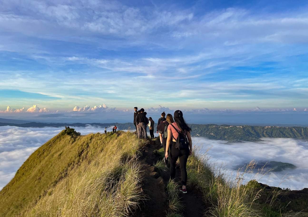 Mount Batur trekking adventure as part of the Best Bali Tour Packages for first-time travelers.